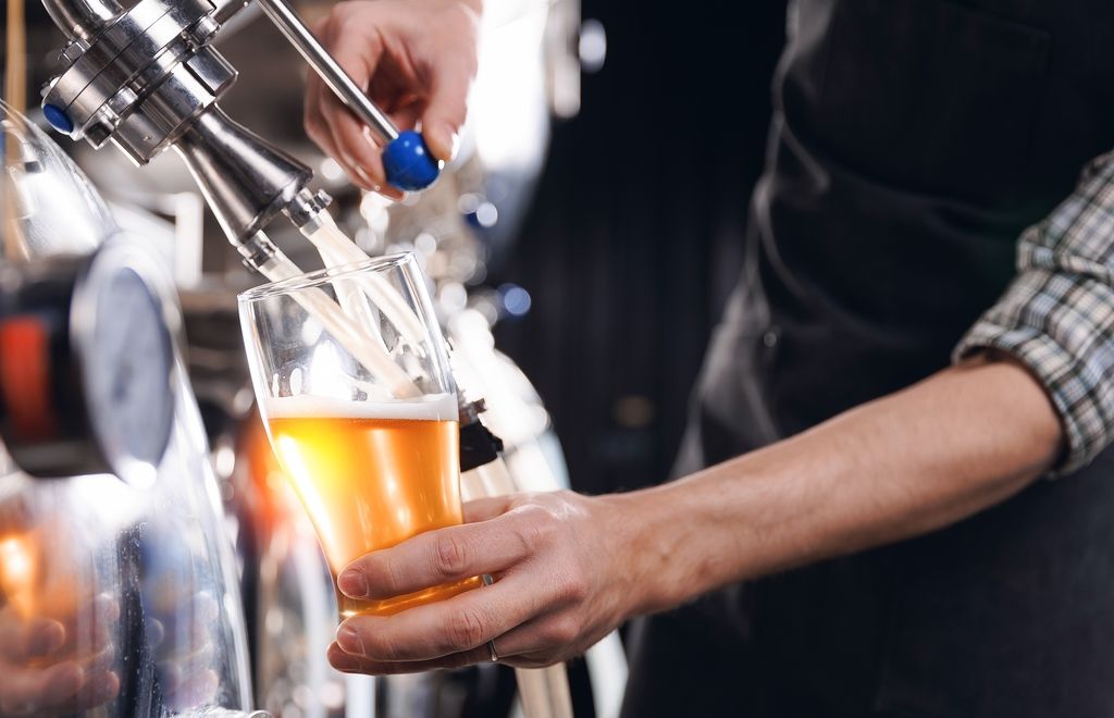beer coming from the tap 